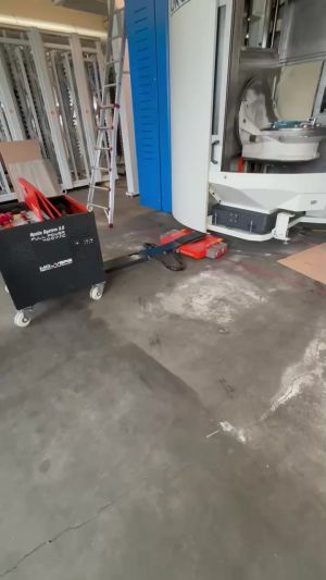 Industrial Warehouse Scene Featuring Equipment and Machinery in Maintenance Setting