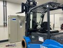 Modern Blue Forklift Inside Industrial Facility with Clean and Organized Environment