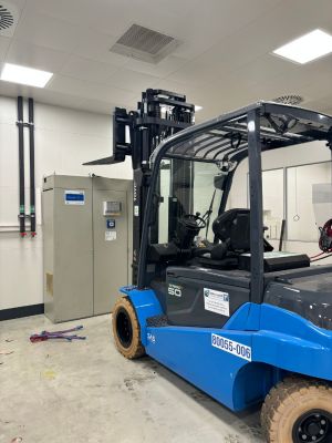 Modern Blue Forklift Inside Industrial Facility with Clean and Organized Environment