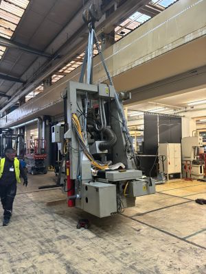 Industrial Workshop with Suspended Machinery and Advanced Equipment in Operation