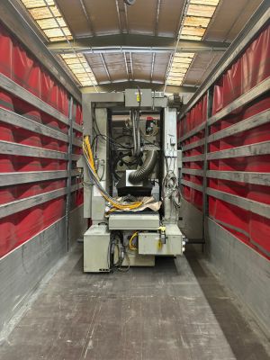 Industrial Machinery Inside Red Truck Trailer for Transportation or Storage