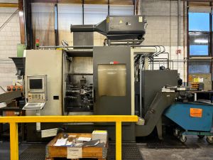 High-Precision Industrial CNC Turning Machine in a Manufacturing Facility