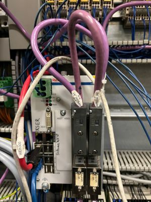 Detailed Close-Up of Electrical Panel Setup with Connected Cables and Devices