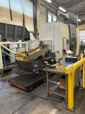 Modern Industrial Manufacturing Machinery in a Factory Setting With Workstations