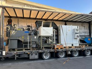 Unloading of Industrial Equipment from a Truck at a Factory