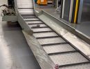 Conveyor System in Operation Within an Industrial Manufacturing Setting
