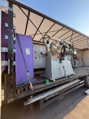 Robotic Equipment Transportation on Customized Truck with Open Roof and Secured Machinery