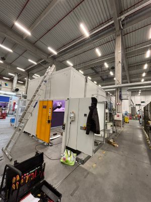 Industrial Workshop Interior Featuring Machinery and Tools with Organized Workspaces